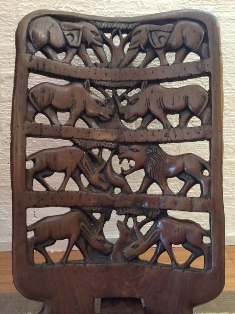 primitive-carved-tension-chair-African-wildlife-motif