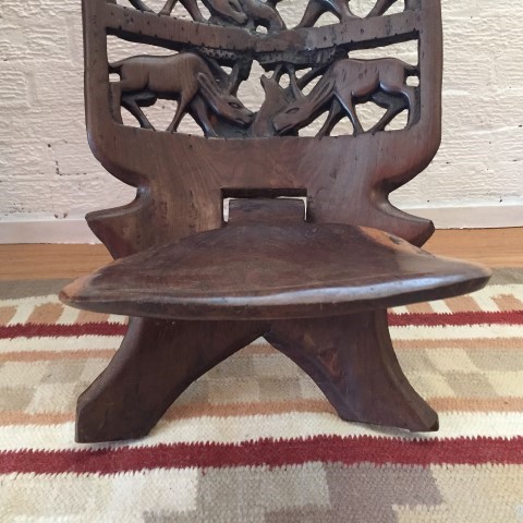 primitive-carved-tension-chair-African-wildlife-motif