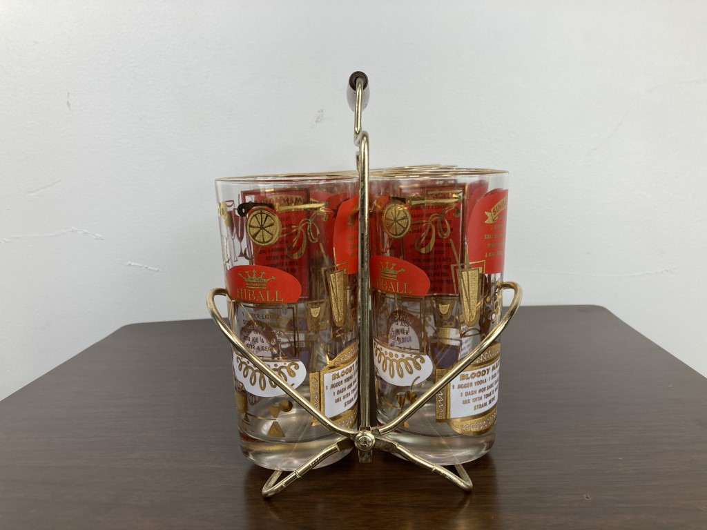 https://epochfurnishings.com/wp-content/uploads/2022/04/drink-recipe-drinking-glasses-brass-caddy-wooden-handle-vintage-mcm-7.jpg