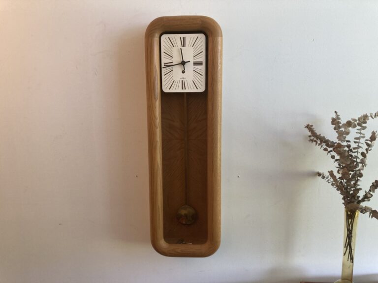 Vintage Pendulum Wooden Wall Clock by Arthur Umanoff for Howard Miller
